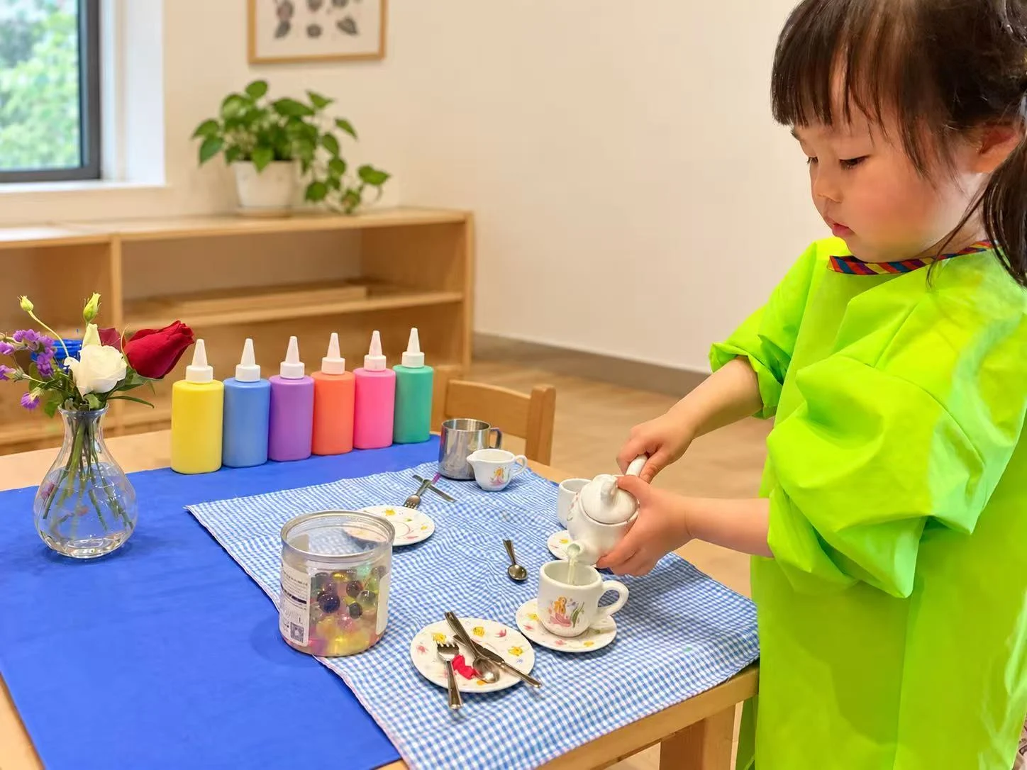 Children exploring hands-on learning materials